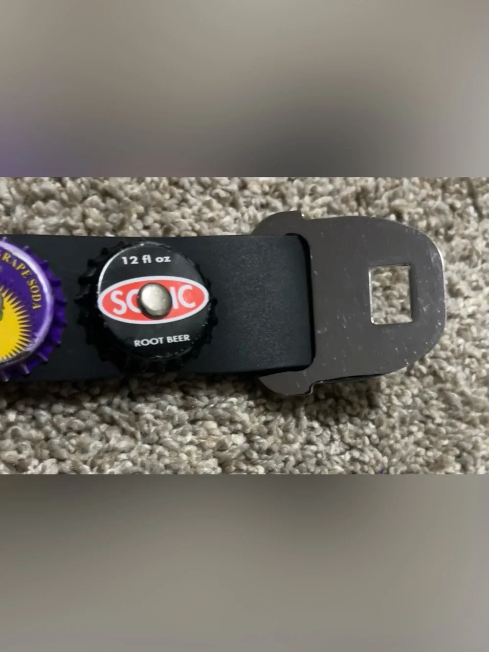 Little Earth seatbelt belt bottle caps